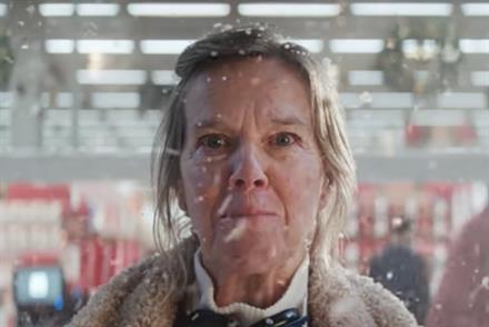 A still of a woman from Tesco's 2021 Christmas TV ad
