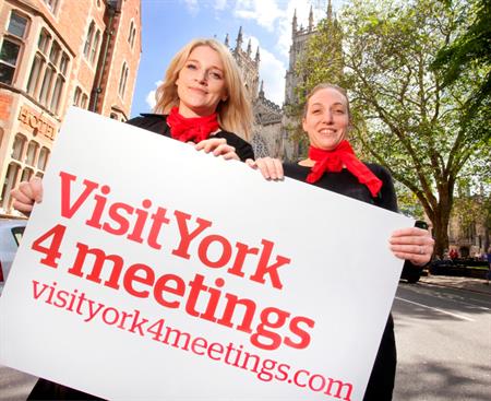 Laura Freer, Business Tourism Manager and Aimee Richardson, Business Tourism Sales & Marketing Executive from Visit York 4 Meetings launching the new brand outside the iconic York Minster