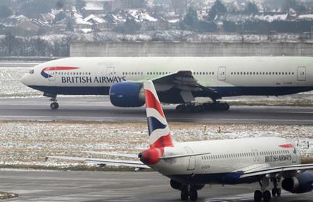 Snowy conditions have caused Heathrow airport to cut flights by 10% today