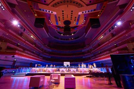 Week In Pictures: Symphony Hall's new stage; ISES Talk; Natural History Museum's stegosaurus