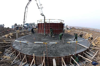 Turbine tower installtion in China, where wind generation surpassed nuclear