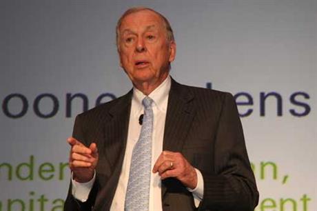 T Boone Pickens: cuts GE order in half