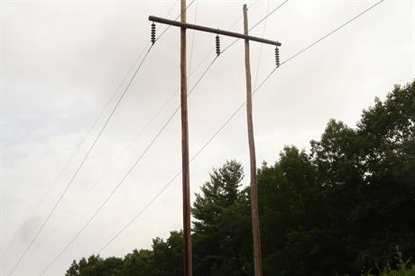 An example of a wooden trident-style power line from the USA. Pic: Jimhann8254, Wikipedia.