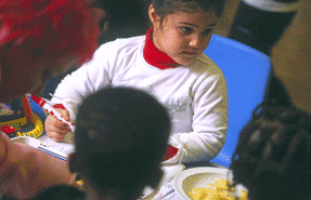 A pilot scheme is providing work-focused services in 30 Sure Start children's centres in England.