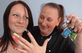 Lisa Hughes (right) received support in setting up a nail painting firm from the Open Door partnership.