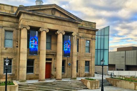 The town hall's classical portico is retained, while an extension provides a new foyer (PIC Oldham Council)