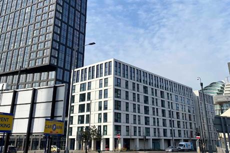 The 35 storey tower contrasts with the five white perimeter blocks (PIC Stephen Gleave)