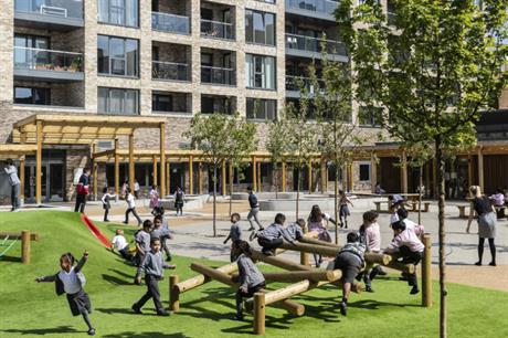The new primary school sits below the new homes (PIC John Sturrock)