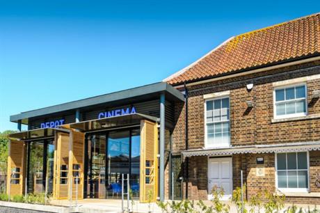 The cinema screens occupy the refurbished warehouse, while the new glazed section provides other services (PIC Burrell Foley Fischer)