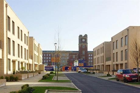 The original factory building provides a focus for the new housing (PIC Studio Partington)