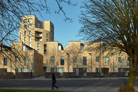 A nine storey cylindrical building is a landmark, sitting alongside open space (PIC Cullinan Studio)