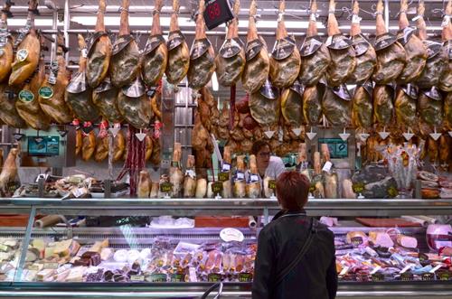 Spanish jamon serrano being sold at Valencia's Mercado Central. Most of Spain's pork is exported. Photo: Kike Calvo/Universal Images Group via Getty Images