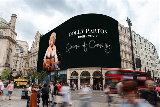 Piccadilly Lights: Ads switched off to honour the late country star. 