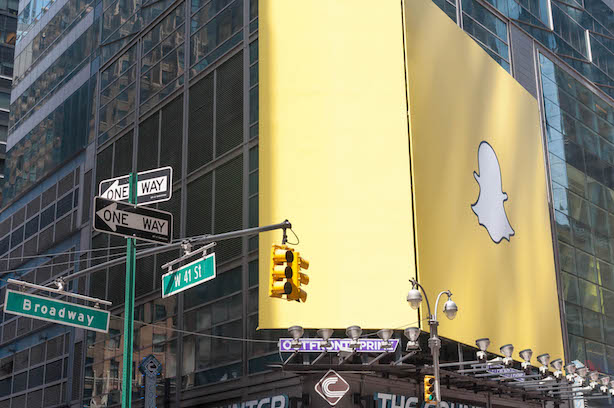 (Image via Wikimedia Commons, by Marco Verch - Snapchat-Werbung auf Times Square New York, CC BY 2.0)