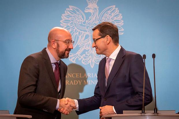 President-elect of European Council Charles Michel (left) and Polish prime minister Mateusz Morawiecki (Photo by WOJTEK RADWANSKI/AFP via Getty Images)
