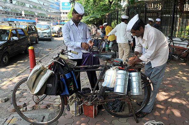Mumbai: home to a sophisticated system to deliver lunch in stainless steel tiffin boxes to office workers. Photo: Indranil Mukherjee/AFP via Getty Images