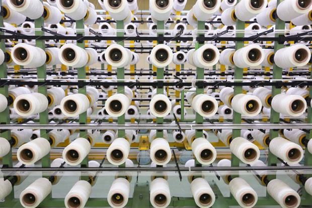 Spools of polyester thread at a Texxcore factory in Volzhsky, Russia. Synthetic fibres are a major source of microplastic pollution, posing a serious challenge to regulators. Photo: Dmitry Rogulin/TASS via Getty Images