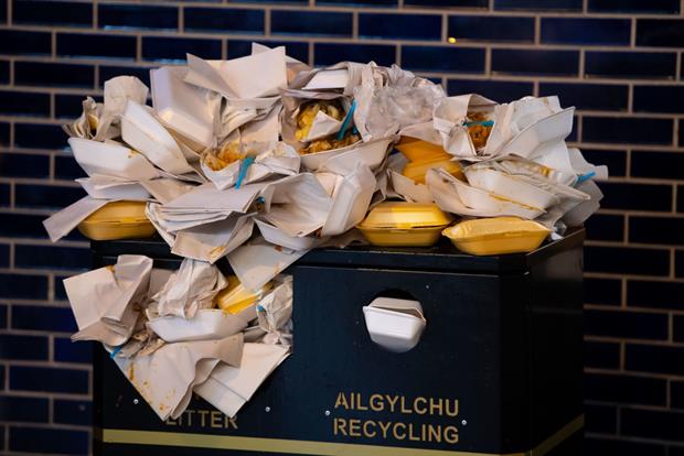 A bin overflowing with food containers, December 2018 in Cardiff, UK. New evidence suggests widespread use of PFAS in paper packaging. Photo: Matthew Horwood via Getty
