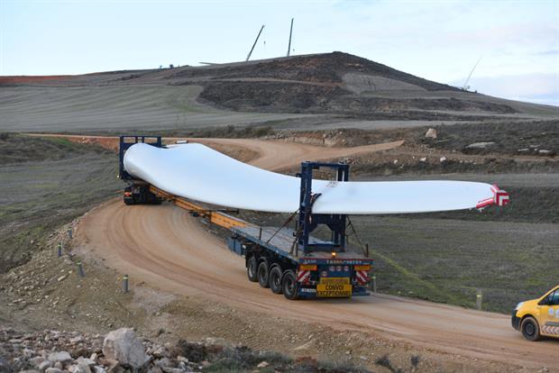 A wind turbine blade is transported near the village of Beltejar in northern Spain, December 2019. The government has been praised for directing post-Covid investment to green projects. Photo: John Milner/SOPA Images/LightRocket via Getty Images