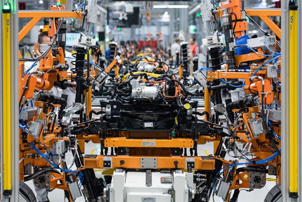 An electric car under assembly in Zwickau, Germany, June 2020. Carmakers have warned against classing lithium compounds used in batteries as hazardous. Photo: Jens Schlueter/Getty Images