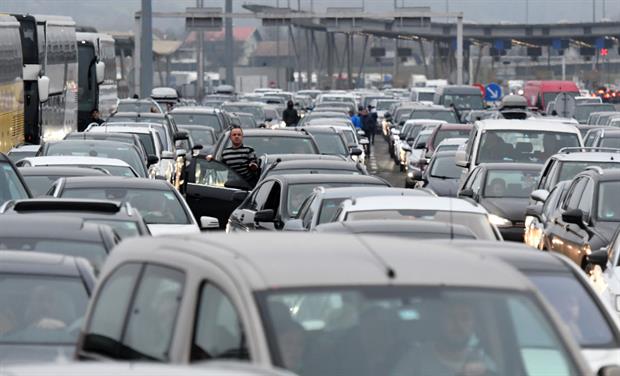 Huge traffic jams at the Bregana border between Croatia and Slovenia, December 2020. Experts have warned car demand is relatively inelastic. Photo: Denis Lovrovic / AFP via Getty
