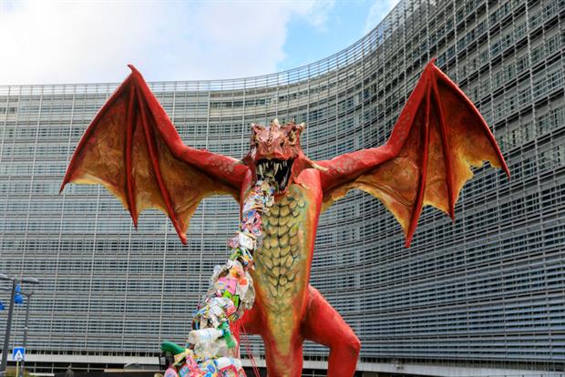 A dragon spews plastic outside the European Commission headquarters in Brussels on Thursday. The EU executive has promised to crack down on plastic waste exports. Photo: Thierry Monasse/Getty Images