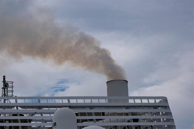 Smoke from the chimney of a ferry in Roscoff, France, September 2021. The IMO will discuss cutting emissions of CO2 and black carbon at a virtual meeting this week. Photo: Mike Kemp/In Pictures via Getty Images