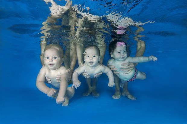 Babies learning to swim underwater in Odessa, Ukraine. Research suggests it is becoming harder to have childen thanks to chemicals pollution. Andrey Nekrasov /Barcroft Media via Getty Images