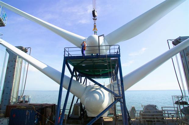Wind turbines under construction near Whistable, UK. The European Commission aims to boost private sector investment in sustainable energy. Photo: Chris Laurens/Construction Photography/Avalon/Getty Images
