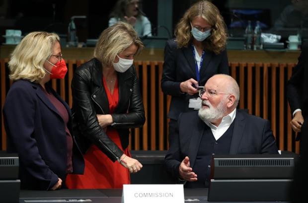 Environment ministers Svenja Schulze and Barbara Pompili speak to Commission vice-president Frans Timmermans during Wednesday's meeting. Photo: EU Council
