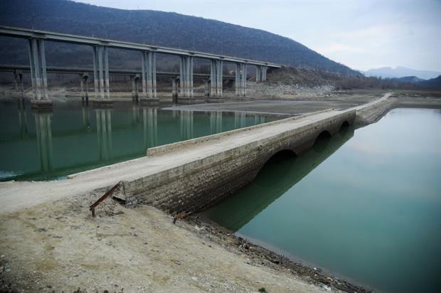 Bulgaria's Georgi Traikov dam, pictured last year during a period of water scarcity that revealed an old bridge. Image: Hristo Rusev/NurPhoto via Getty Images