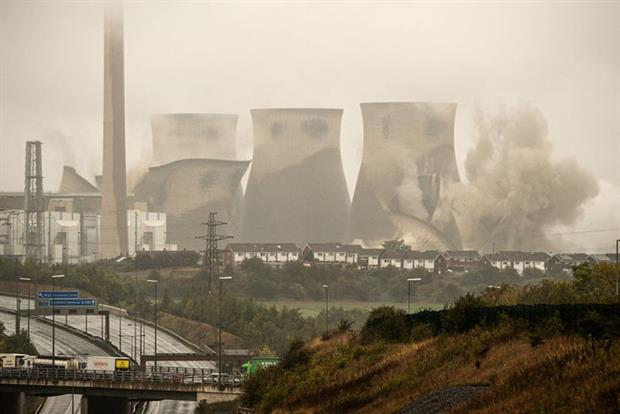 Coal collapse: four cooling towers at the UK's Ferrybridge plant were demolished in October 2019 (Photo by OLI SCARFF/AFP via Getty Images)