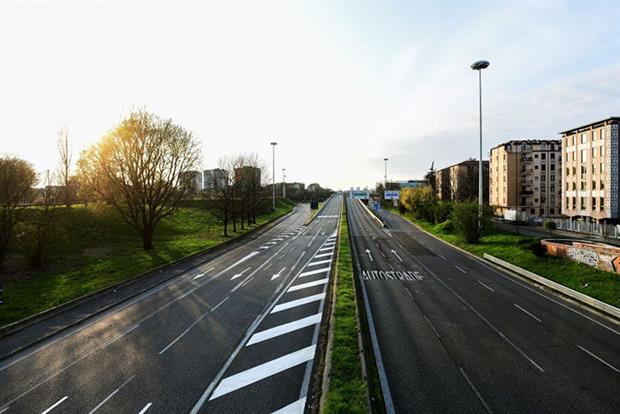 Covid-19: The Viale Alcide de Gasperi, usually one of the busiest roads of Milan is empty during coronavirus lockdown (Photo by PIERO CRUCIATTI/AFP via Getty Images)