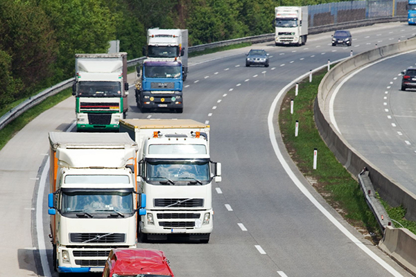 Transport, lorries on motorway (photograph: ginasanders/123RF)