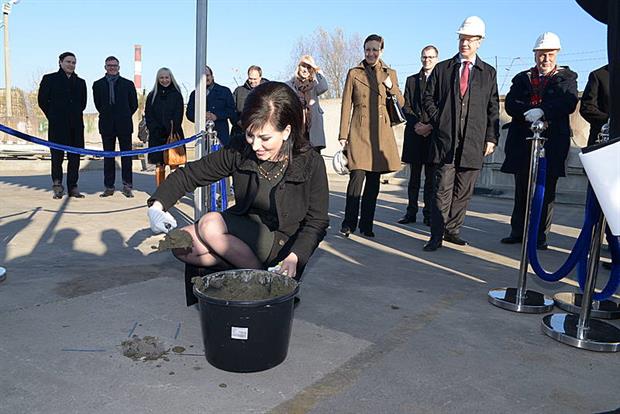 Lithuanian environment minister Daiva Matoniene starts the construction work