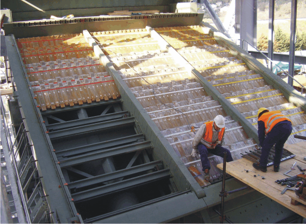 A grate being installed, image copyright Martin