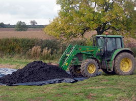 Compost-like output from Leicester City’s MBT plant being spread on farmland. This will no longer count as recycling under government plans (credit: ADAS)