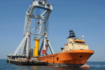 Offshore wind turbine being installed (photo credit: SCRIA)