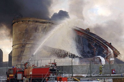 Fire crews try to control aftermath of Buncefield explosion (credit: AFP/Getty Images)