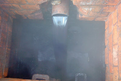 Dye pouring into a drain. Courtesy of Severn Trent