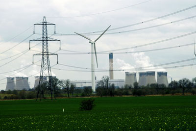 Wind turbine next to the Drax coal-fired power station (photo: David Rogers CC-BY-SA-2.0 via Geograph)
