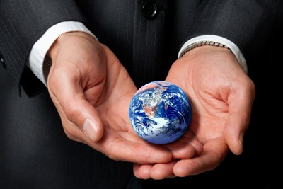 Man in suit holding the globe (picture: Cameraydave | dreamstime.com)
