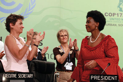 Christiana Figueres and Maite Nkoana-Mashabane celebrate COP 17 deal (picture: AFP/Getty)