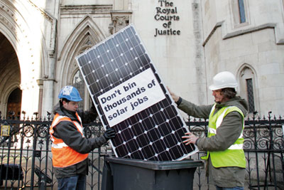 Protesters unhappy with cuts to solar feed-in tariffs outside the Royal Courts of Justice (picture: Friends of the Earth)