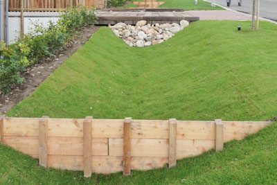 Examples of sustainable drainage systems include shallow ditches called swales (credit: Yellow Book CC BY 2.0)