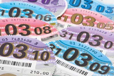 Tax discs. Credit: Jonathon Ball/ Alamy