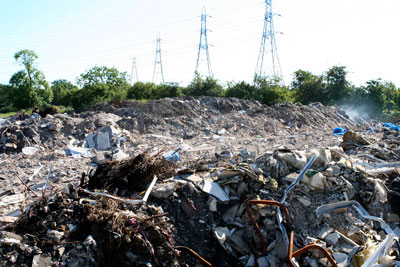 Phipps illegally stored and burned waste at his Michelin farm which was in a landscape improvement area