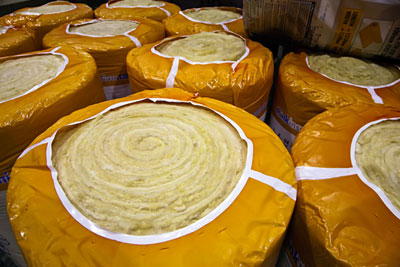 Rolls of ceiling insulation (photograph: Chris Howes/Wild Places Photography/Alamy)