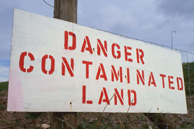 Contaminated land sign (credit: Robert Brook/Alamy)