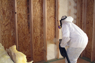Cavity wall insulation being installed (credit: Dreamstime.com)